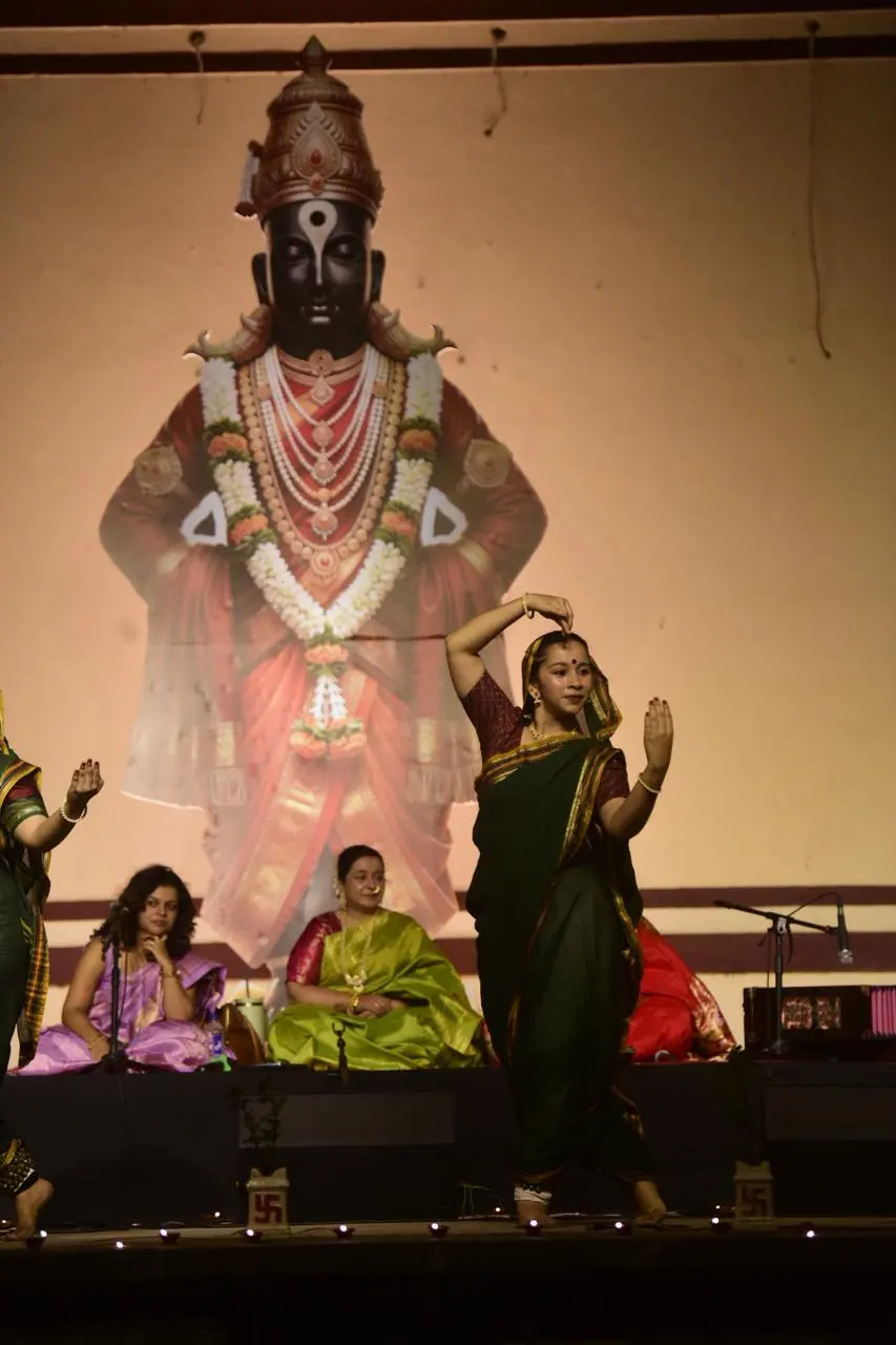 Classical dancer performing on stage at a cultural programme
