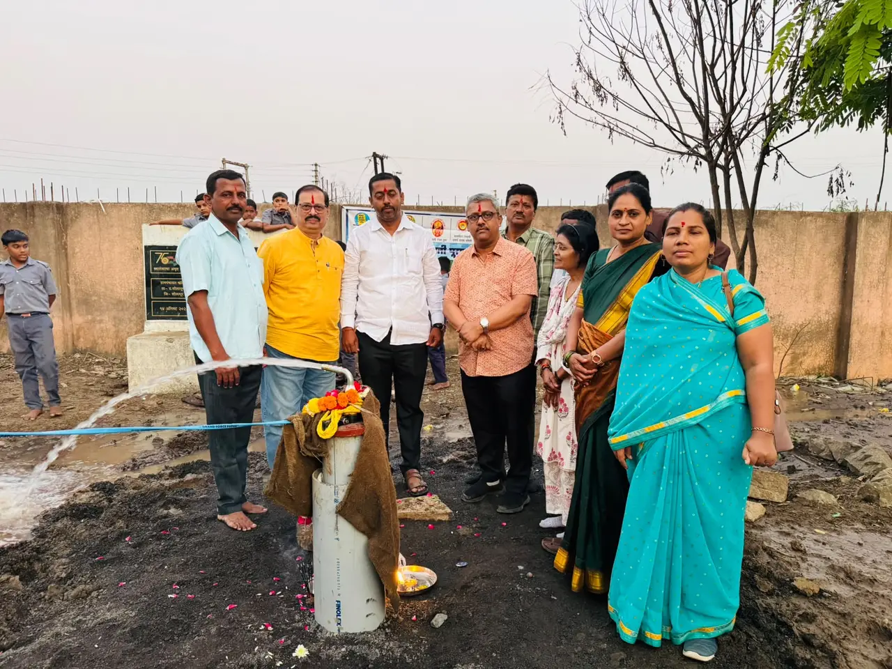 Villagers and school staff at a newly installed borewell at a Zilla Parishad school